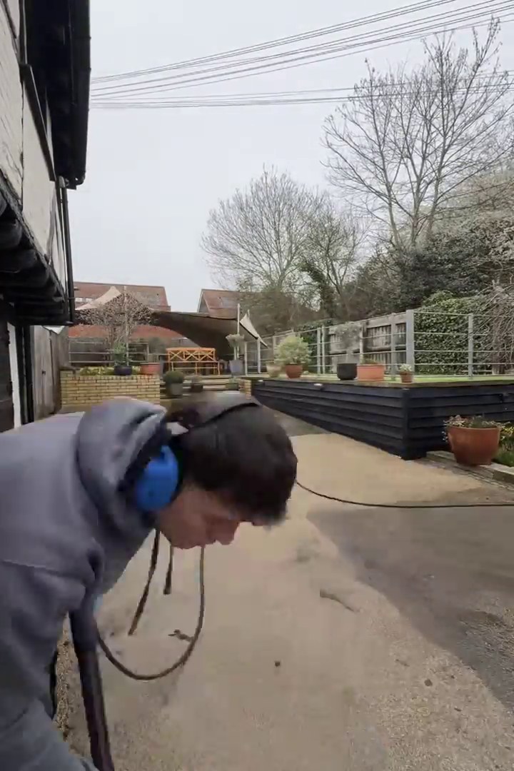 Pressure washing a patio